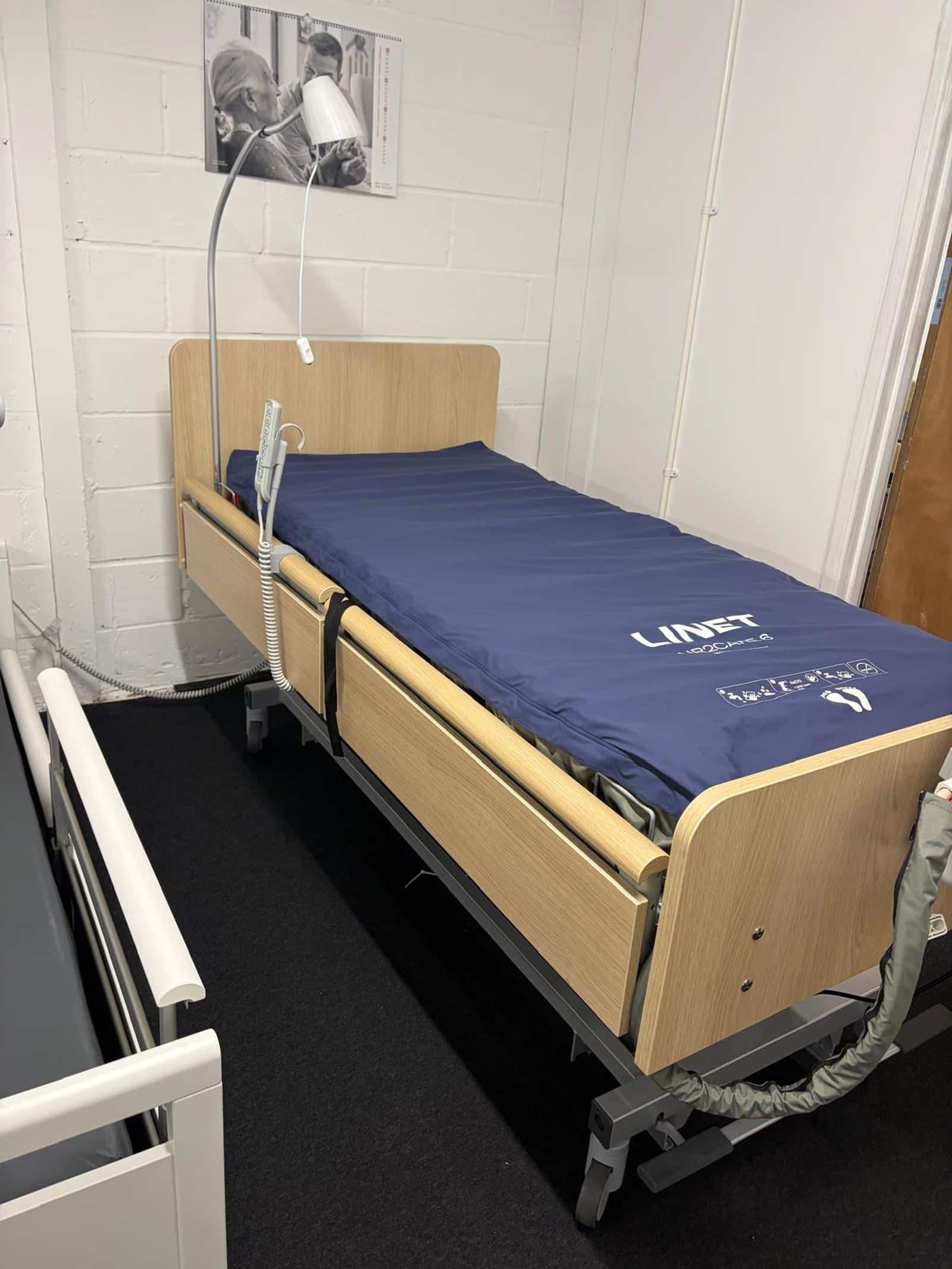 LINET AirCare pressure-relief mattress system on a profiling bed